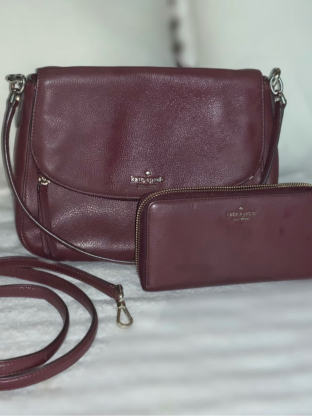 kate spade burgundy leather shoulder bag and wallet with gold logo